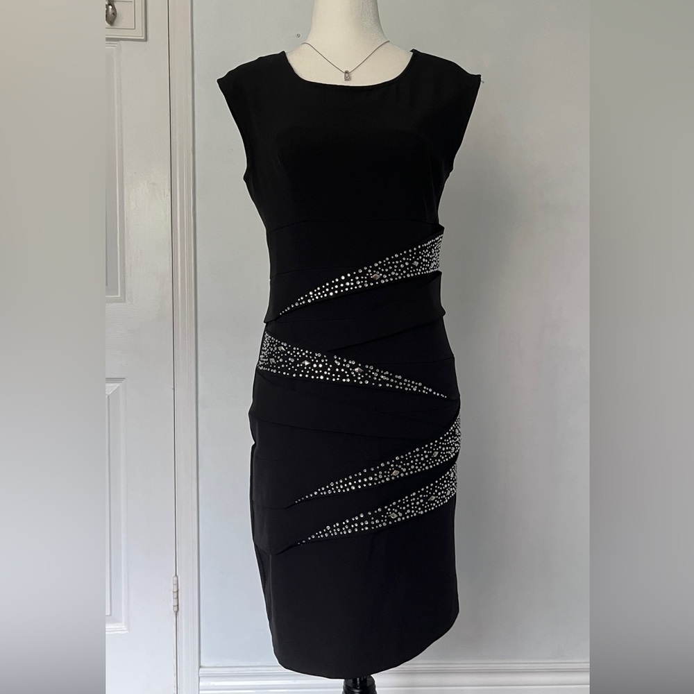 Black sleeveless bodycon dress with embellished crystals